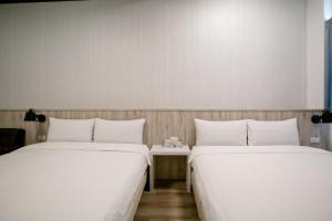 Postel nebo postele na pokoji v ubytování Starrywhale hostel