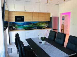 Telewizja i/lub zestaw kina domowego w obiekcie Apartament Rodzinny Centrum Zakopane