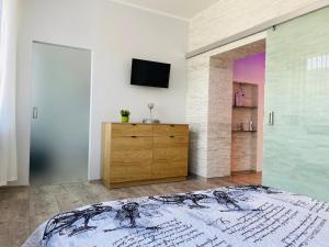 Telewizja i/lub zestaw kina domowego w obiekcie Apartament Rodzinny Centrum Zakopane