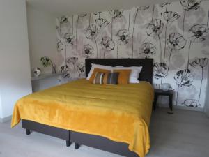 Uma cama ou camas num quarto em Kitrino