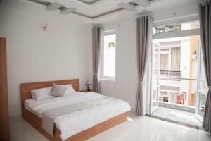 Postel nebo postele na pokoji v ubytování ALEX HOTEL Peony