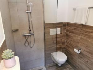 Kúpeľňa v ubytovaní Ferienwohnung Saunahaus