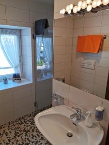 Kúpeľňa v ubytovaní Ferienwohnung Saunahaus