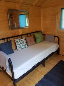 מיטה או מיטות בחדר ב-Quinta Portugo