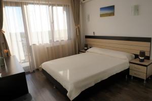 Postel nebo postele na pokoji v ubytování Indeep Club