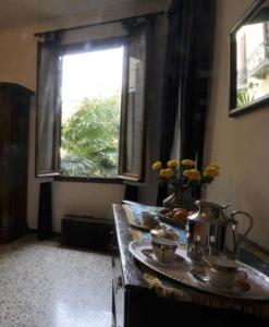 a kitchen with a sink and a window at Ca' Turelli in Venice