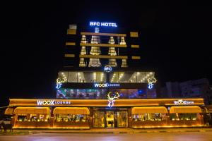 a building with christmas lights in front of it at Hotel BFC Spa & Sport in Bursa