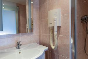 Koupelna v ubytování Hotel Slezan
