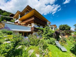 Ogród w obiekcie Das Stubai - exklusiv, einzigartig & nachhaltig