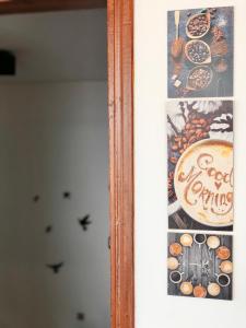 a picture of a sign on a wall with food on it at Kekova Hotel in Kaş