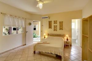 Cama ou camas em um quarto em Pousada Villa Maritima