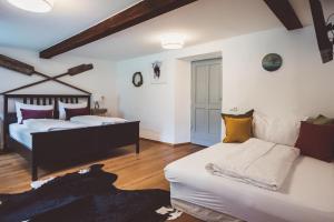 Postel nebo postele na pokoji v ubytování Chalet am Sonnenhang