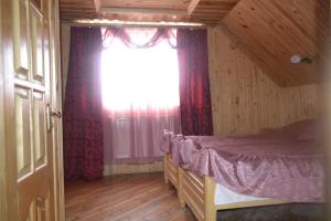 Postel nebo postele na pokoji v ubytování Sadyba Hatynka
