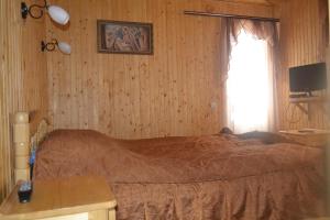 Postel nebo postele na pokoji v ubytování Sadyba Hatynka