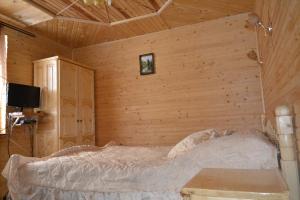 Postel nebo postele na pokoji v ubytování Sadyba Hatynka