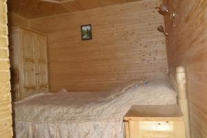 Postel nebo postele na pokoji v ubytování Sadyba Hatynka