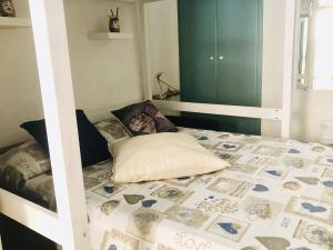 Voodi või voodid majutusasutuse casa vacanza SCIACCA’S CORAL toas