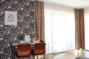 Posedenie v ubytovaní Apartament Mariva B03 z ogródkiem - Pobierowo - blisko morza - przy kompleksie Grand Laola SPA