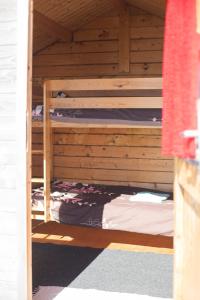 Postel nebo postele na pokoji v ubytování Paradise Beach Surf Bungalow Medium