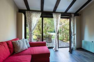 Posezení v ubytování Doppelhaus Villa Casa Alpe Adria