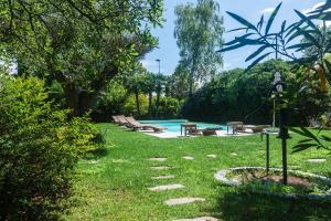Bazén v ubytování Doppelhaus Villa Casa Alpe Adria nebo v jeho okolí