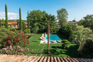 Bazén v ubytování Doppelhaus Villa Casa Alpe Adria nebo v jeho okolí