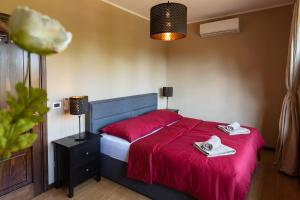 Postel nebo postele na pokoji v ubytování Doppelhaus Villa Casa Alpe Adria