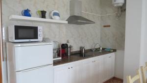 Kuchnia lub aneks kuchenny w obiekcie Apartamentos Orzola