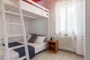 Posteľ alebo postele v izbe v ubytovaní Villa Elisea