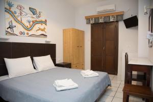 Letto o letti in una camera di Villa Stella
