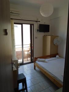 Fotografia z galérie ubytovania Orfeas Rooms v destinácii Vasiliki