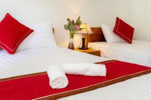 Postel nebo postele na pokoji v ubytování Tam Coc Lotus Flower Homestay
