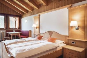 Voodi või voodid majutusasutuse BergHotel Majarei toas