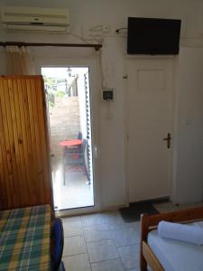 Fotografia z galérie ubytovania Orfeas Rooms v destinácii Vasiliki + 37 fotografií