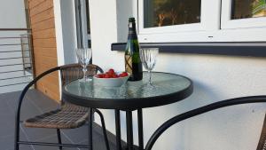 Nápoje v ubytovaní Apartament Bałtyk