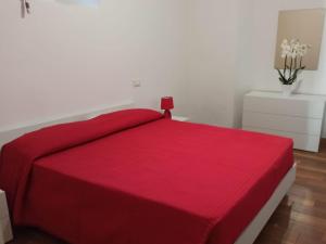 Posteľ alebo postele v izbe v ubytovaní A due passi dal castello
