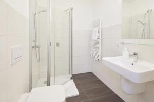 Koupelna v ubytování VR-Serviced Apartments Obergeis + 17 fotografií