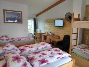 Postel nebo postele na pokoji v ubytování Max Motel