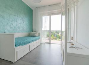 A bed or beds in a room at La Terrazza