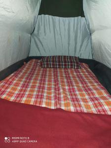 Postel nebo postele na pokoji v ubytování Harmony Sunrise Guest House & Restaurant