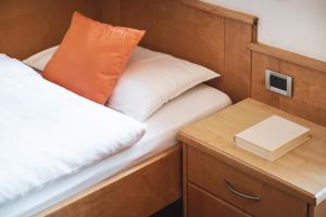 Ένα ή περισσότερα κρεβάτια σε δωμάτιο στο BergHotel Majarei