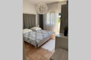 Un pat sau paturi într-o cameră la Casa Fumica rooms
