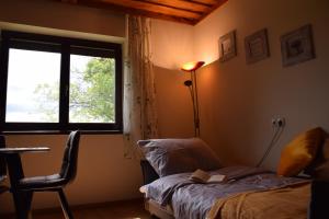 Postel nebo postele na pokoji v ubytování Ferienhaus Jagafranzl