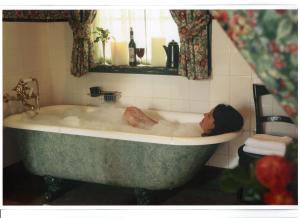 Ett badrum på The Royal Hotel Pilgrims Rest