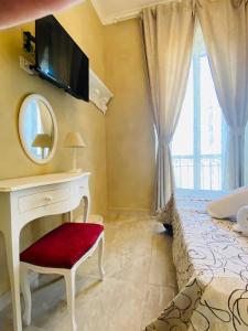 Кровать или кровати в номере Boutique Hotel Calais Milano