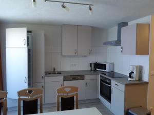 Kuchyňa alebo kuchynka v ubytovaní Appartement Haus Gatterer