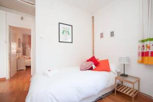 Llit o llits en una habitació de Apartamento Parc Güell