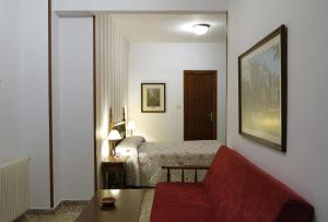 Katil atau katil-katil dalam bilik di Hotel Andalucía