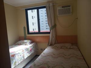 Katil atau katil-katil dalam bilik di Residencial Porto de Iracema