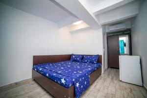 Postel nebo postele na pokoji v ubytování Vila Tributte